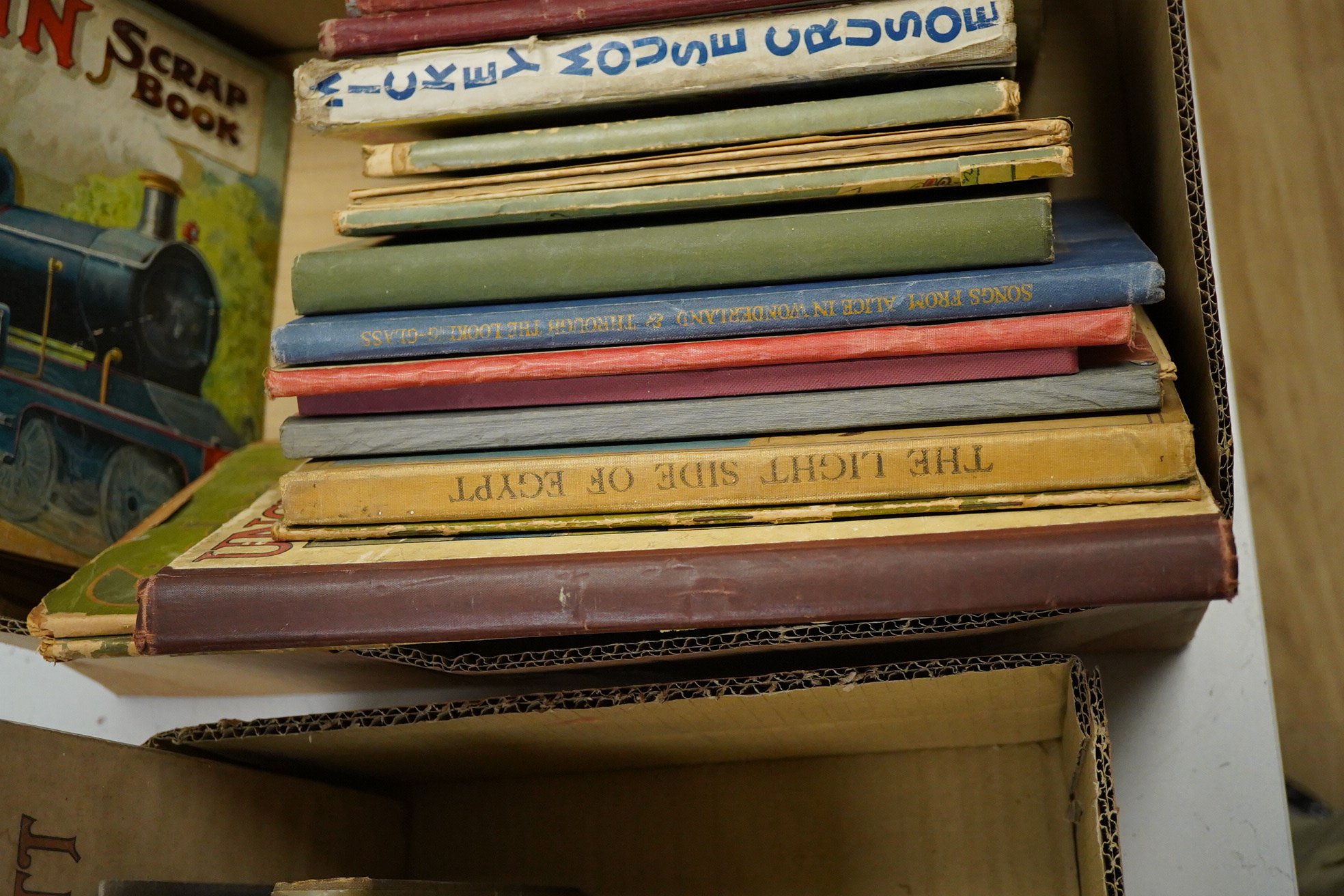 Children’s works - The Train Scrapbook, Ernest Nister, London and E.P. Dutton & Co., New York, [c. 1910]; Disney, Walt - Mickey Mouse Crusoe, 1st UK edition, Collins Clear-Type Press, [1935]; Harris, Joel Chandler - Uncl